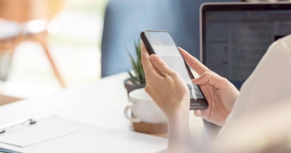 Women holding mobile phone