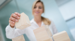 Woman stacking blocks