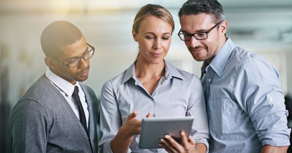 3 people looking over at an ISV Partner