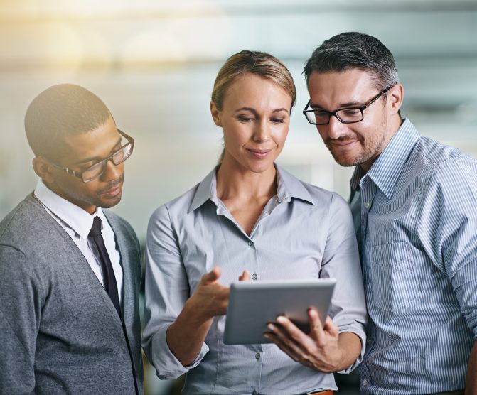 3 people looking over at an ISV Partner