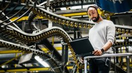 Factory engineer working on manufacturing to avoid production delays